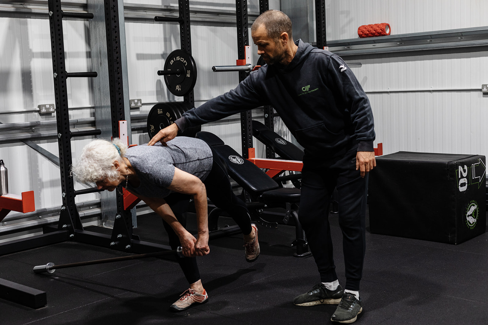 Personal trainer coaching adult client at Cornwall High Performance gym in Truro